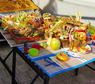 A table with food and objects on it

Description automatically generated
