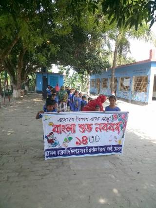 A group of children carrying a banner

Description automatically generated