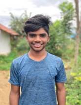 A picture containing person, human face, outdoor, smile  Description automatically generated