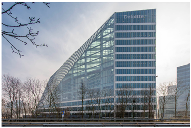 A building with a triangular shape

AI-generated content may be incorrect.
