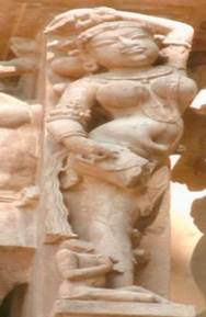 A stone statue of a person

Description automatically generated