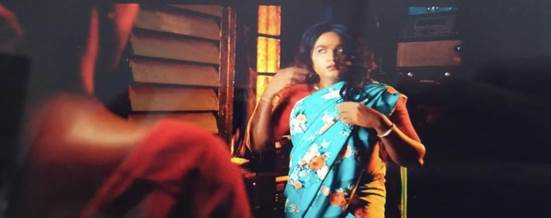 A person in a blue dress

Description automatically generated with low confidence