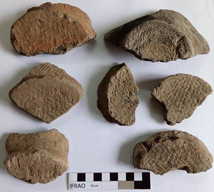 A group of pieces of clay

Description automatically generated