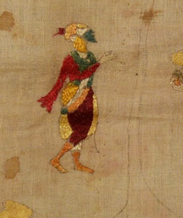 A picture containing text, floor, fabric

Description automatically generated