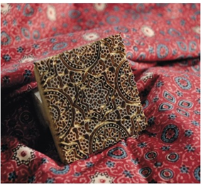 A close-up of a wooden block
AI-generated content may be incorrect.