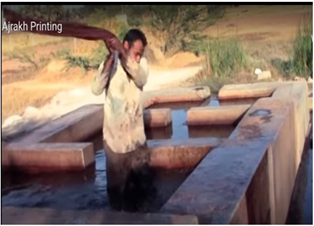 A person washing his body in a pool of water
AI-generated content may be incorrect.