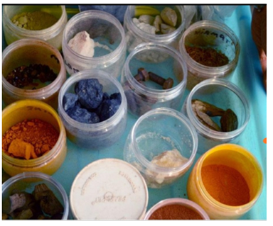 A group of containers of different colors
AI-generated content may be incorrect.