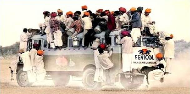 A group of people on a car

Description automatically generated with medium confidence