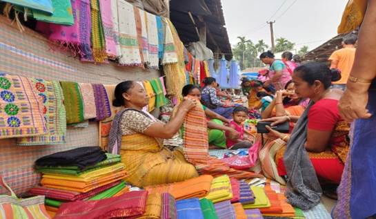 Women sitting in a market

Description automatically generated