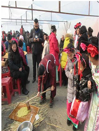 Sacrificial Preparation During the Xinbin Manchu Ancestral Worship Ceremony, Illustrating a Key Stage Within the Ritual Sequence Where Offerings are Ritually Activated Prior to Ceremonial Culmination (Fieldwork Photograph by the Author, 2025).