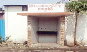 A white building with a door open

Description automatically generated with medium confidence