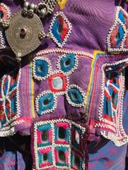 A picture containing textile, pattern (fashion design), pattern

Description automatically generated