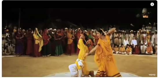 The main characters posing as Radha and Krishna in the song Radha Kaise Na Jale  (Source -  SonyMusicIndiaVEVO) Ref. - 25