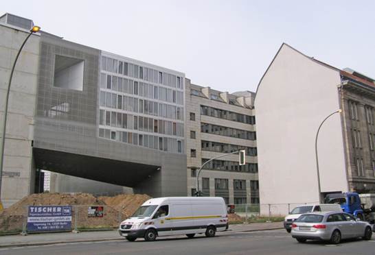 A picture containing outdoor, building, land vehicle, vehicle

Description automatically generated
