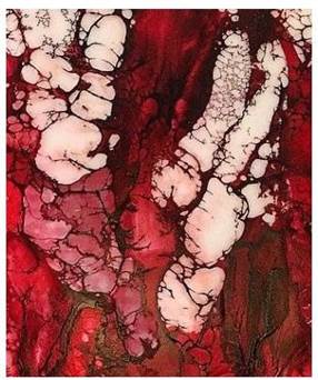 A close-up of a red and white marbled surface

Description automatically generated